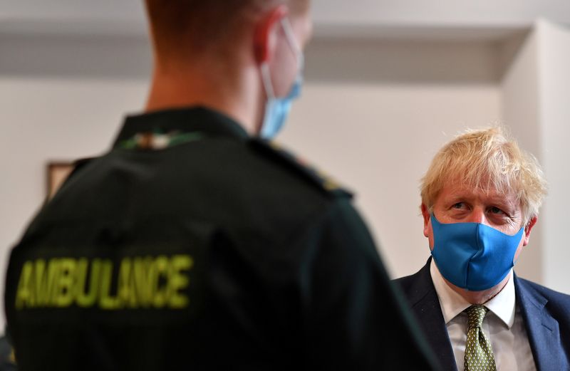 Britain’s Prime Minister Boris Johnson visits headquarters of the London