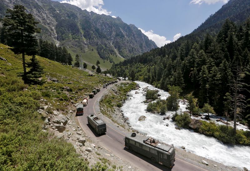 FILE PHOTO: Indian Army convoy moves along a highway leading