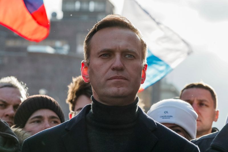 Russian opposition politician Alexei Navalny takes part in a rally