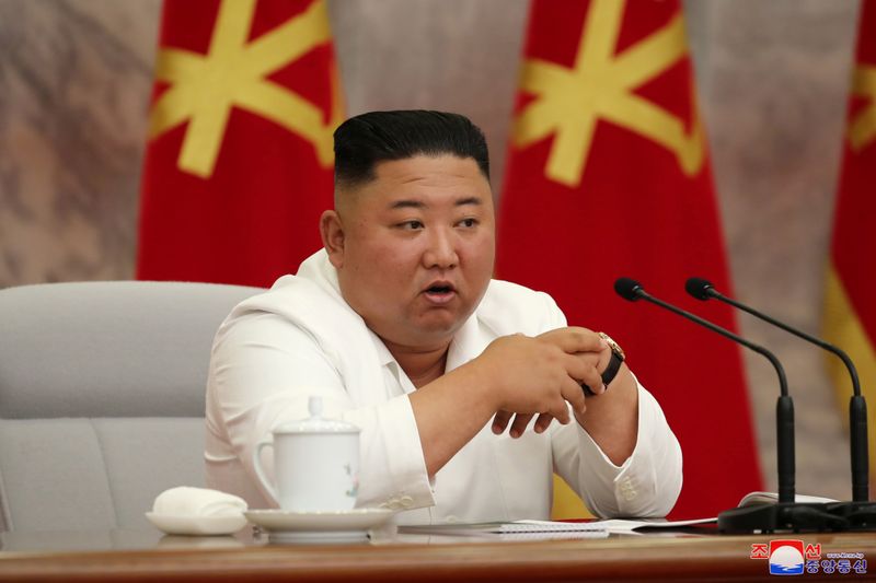 North Korean leader Kim Jong Un guides the 14th enlarged