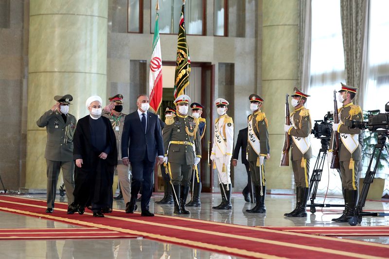 Iranian President Hassan Rouhani and Iraqi Prime Minister Mustafa al-Kadhimi
