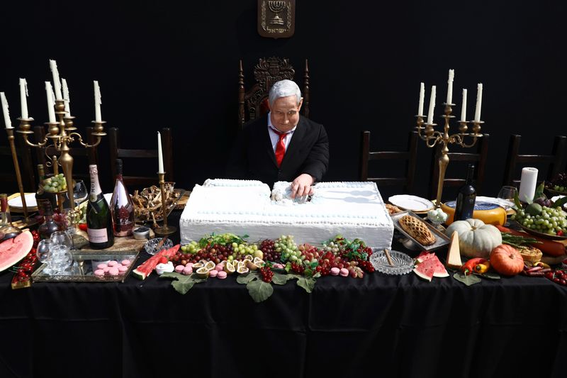 Israel’s Netanyahu depicted in artwork recalling at “Last Supper” amid
