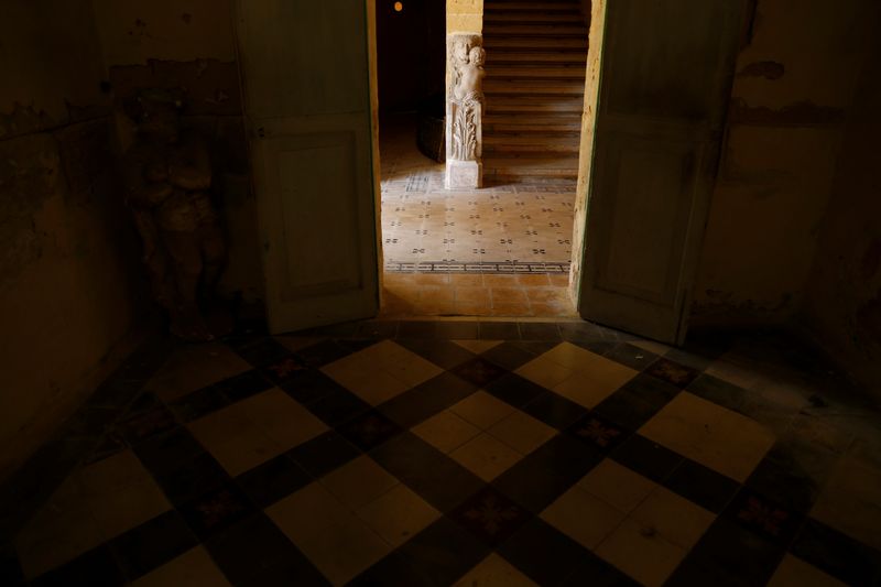 The Wider Image: Step inside the crumbling villa where Queen