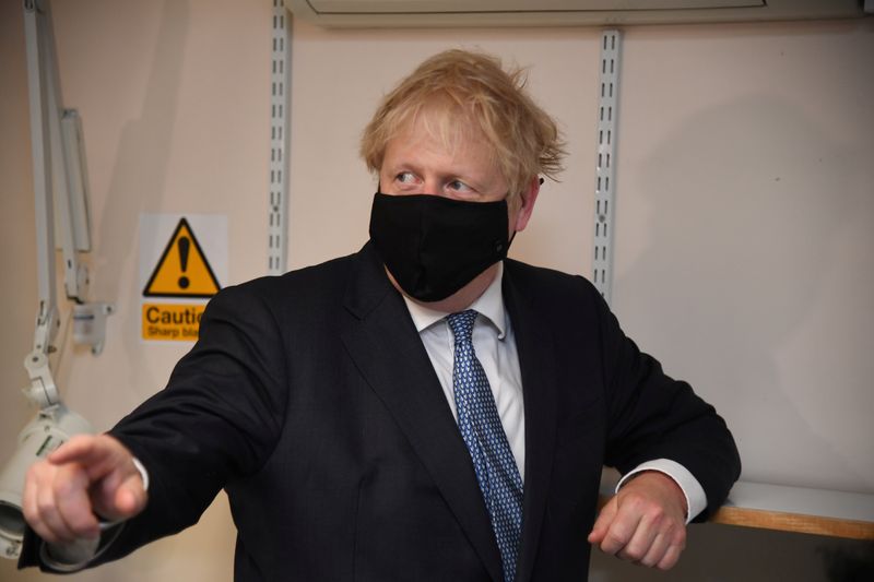 Britain’s Prime Minister Boris Johnson visits the Tollgate Medical Centre