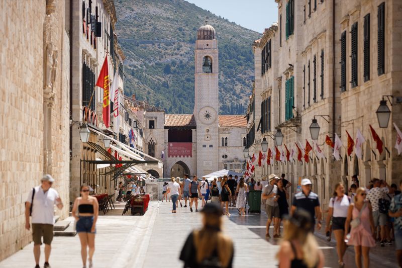 Tourists are seen at Stradun street in Dubrovnik