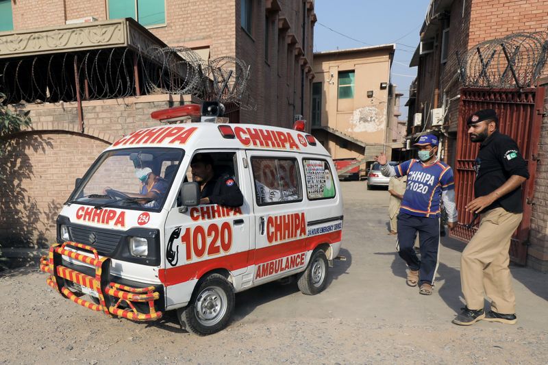 An ambulance moves out of the Khyber Medical College (KMC)