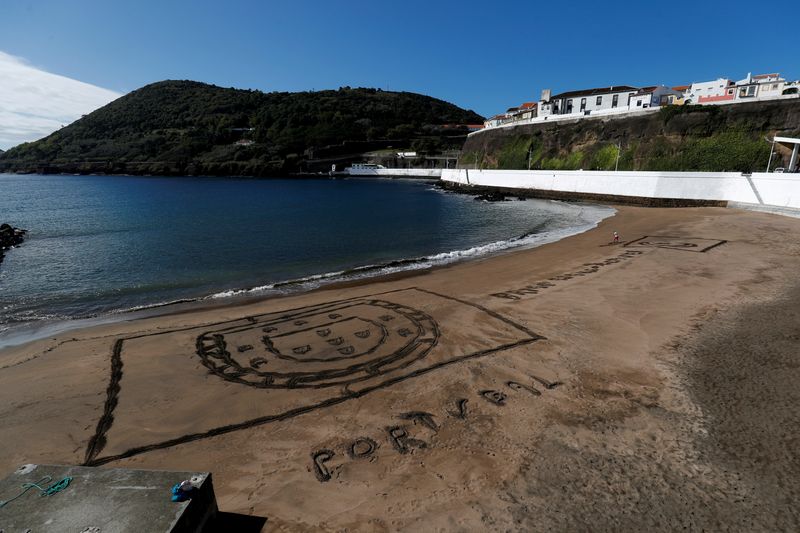 FILE PHOTO: Portugal’s coat of arms is seen carved in