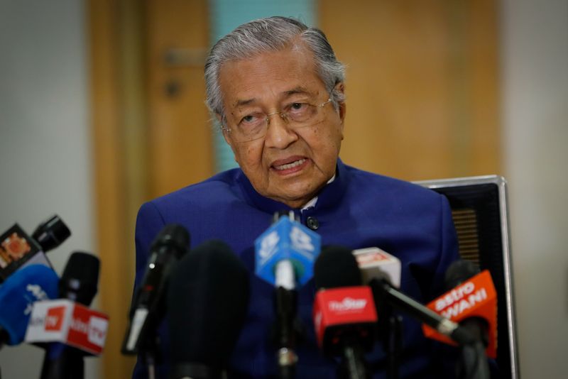 Malaysia’s former Prime Minister Mahathir Mohamad speaks during a news