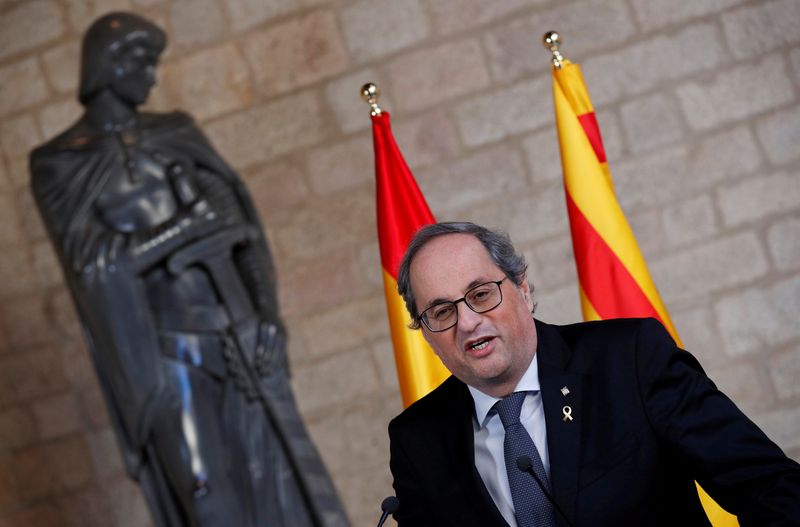 FILE PHOTO: Spain’s PM Sanchez and Catalan regional leader Torra