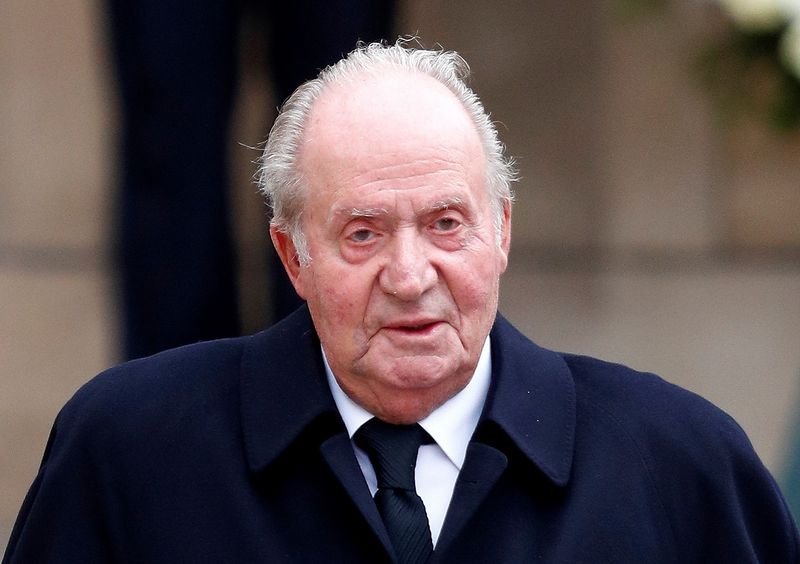 FILE PHOTO: Spain’s former king, Juan Carlos, leaves after attending