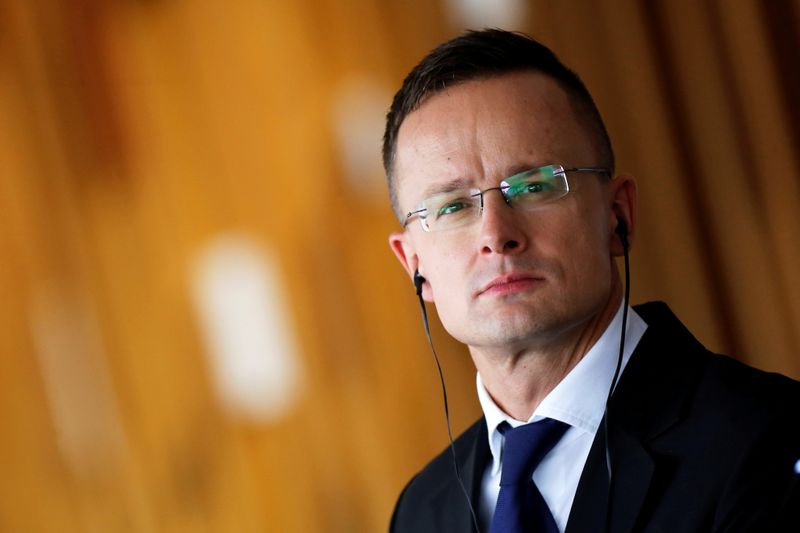 Hungarian Foreign Minister Peter Szijjarto attends a news conference at