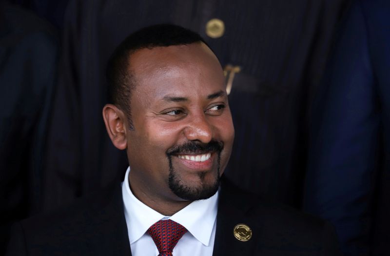 FILE PHOTO: Ethiopia’s Prime Minister Abiy Ahmed poses for a