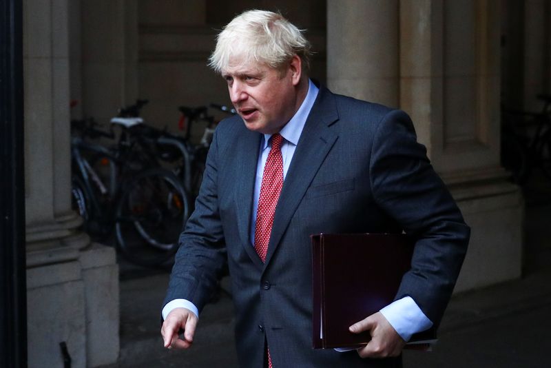 Britain’s Prime Minister Boris Johnson leaves after a cabinet meeting,
