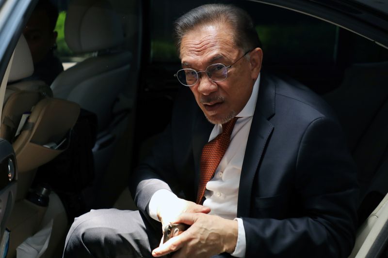 Malaysia’s politician Anwar Ibrahim arrives for a meeting in Petaling
