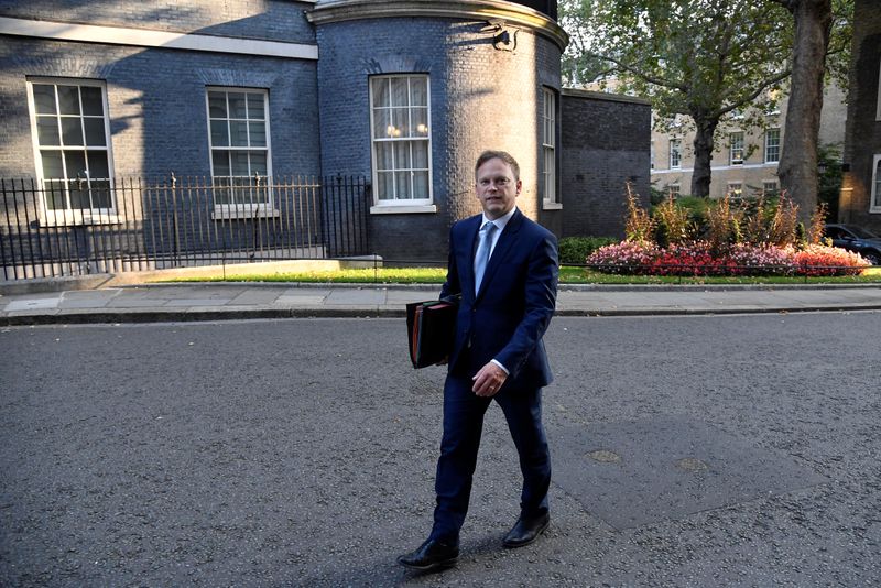 Britain’s Transport Secretary Grant Shapps walks outside Downing Street in