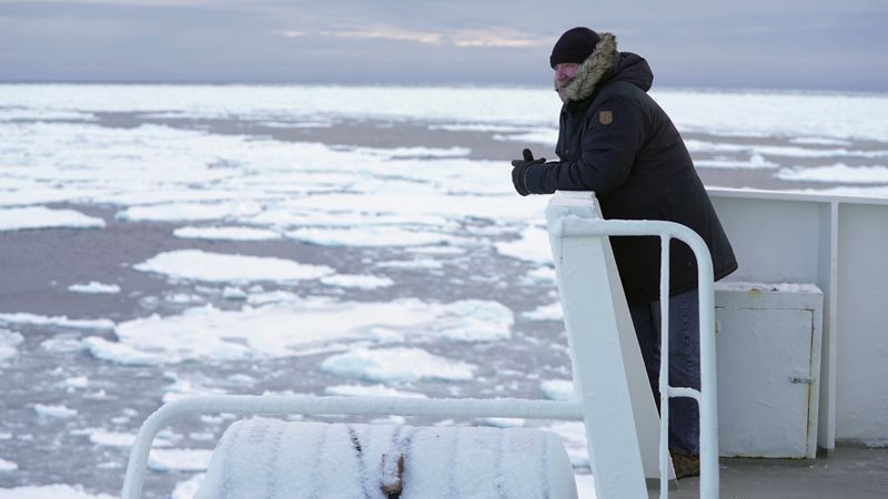 Ice navigator Paul Ruzycki of Canada looks on aboard the