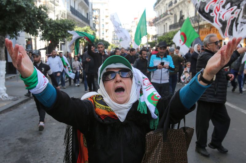 FILE PHOTO: A woman gestures during a demonstration in Algiers
