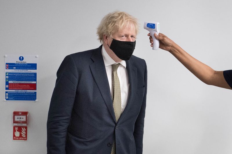 Britain’s Prime Minister Boris Johnson visits the Chase Farm Hospital