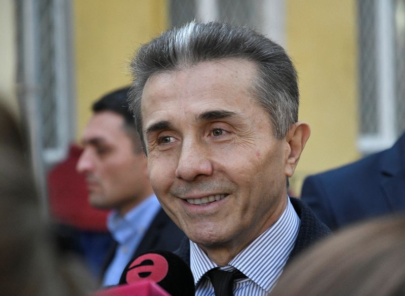 Georgia’s former Prime Minister Ivanishvili visits a polling station during