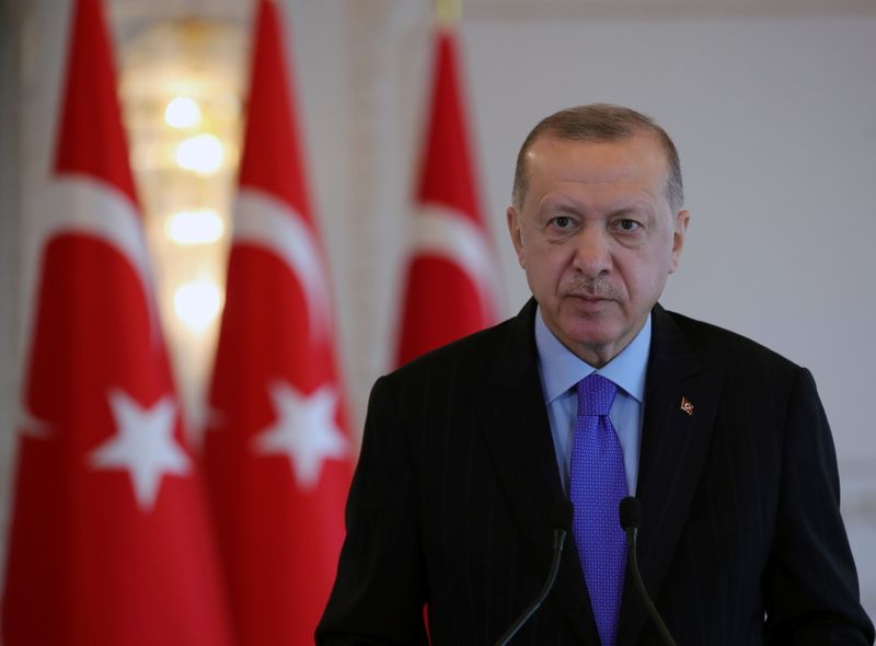 Turkish President Erdogan attends a satellite technologies event through live