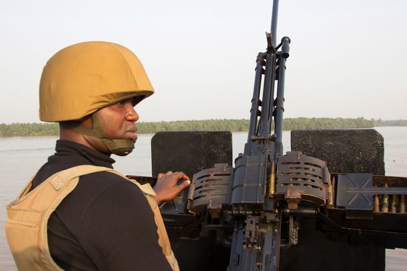 canFILE PHOTO: A naval officer mans a machine gun on