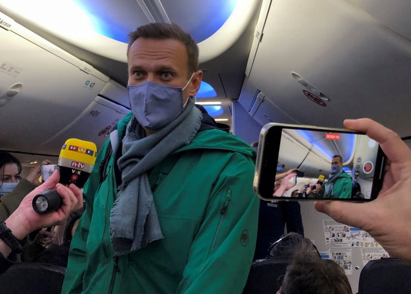 Russian opposition leader Alexei Navalny is seen on board a