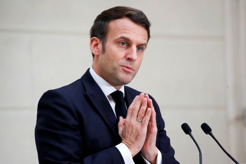 FILE PHOTO: French President Emmanuel Macron delivers a speech to