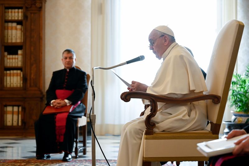 Pope Francis speaks during his weekly general audience at the