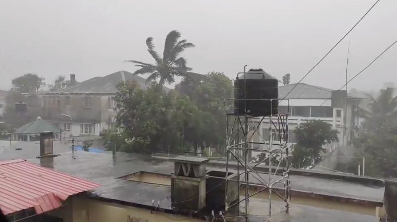 Rain falls before the landfall of cyclone Eloise in Beira
