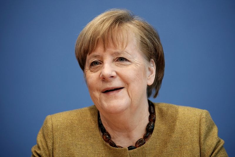 FILE PHOTO: German Chancellor Angela Merkel holds a news conference