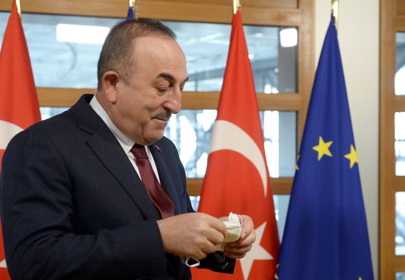FILE PHOTO: Turkish Foreign Minister Mevlut Cavusoglu and European Council