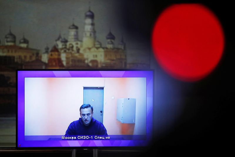 Russian opposition leader Alexei Navalny is seen on a screen