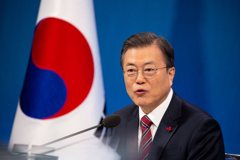 FILE PHOTO: South Korean President Moon Jae-in holds an online