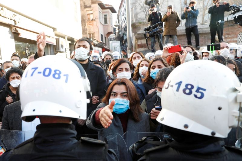 People attend a demonstration in Istanbul