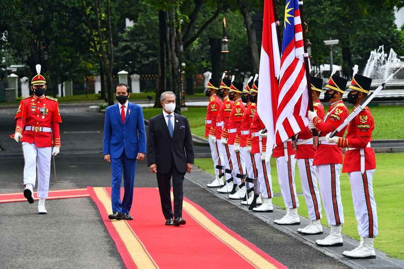 Malaysian Prime Minister Muhyiddin Yassin meets Indonesian President Joko Widodo