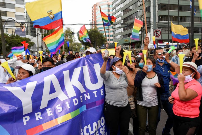 Supporters of Ecuador’s presidential candidate Yaku Perez gather outside a
