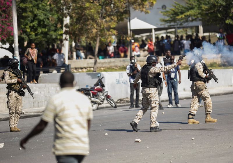 Police clash with demonstrators during protests against Haiti’s President Jovenel