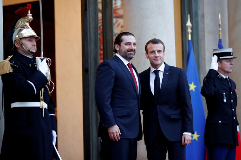 FILE PHOTO: French President Emmanuel Macron welcomes Lebanese Prime Minister