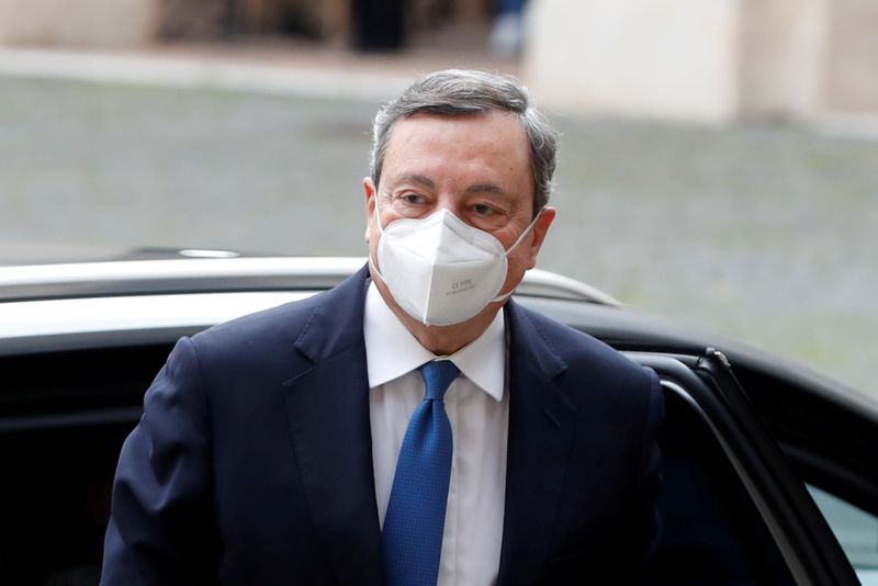 FILE PHOTO: Former European Central Bank President Mario Draghi arrives