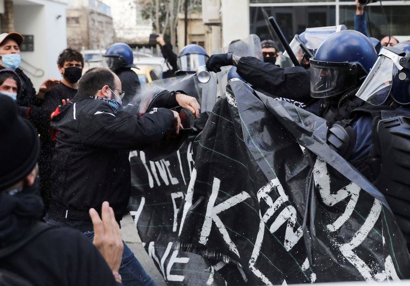 FILE PHOTO: Protesters and activists clash with riot police during