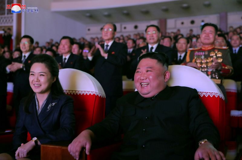 FILE PHOTO: North Korean leader Kim Jong Un and his
