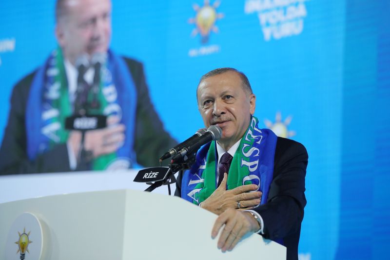 FILE PHOTO:  Turkish President Tayyip Erdogan addresses members of