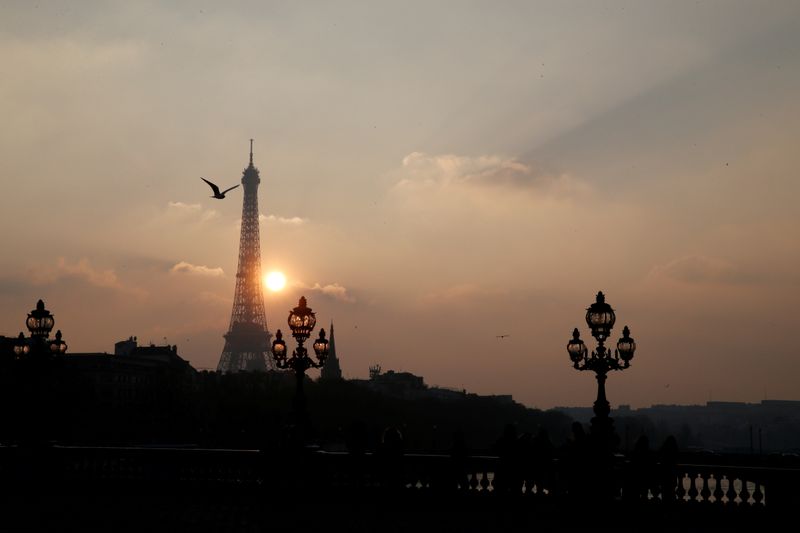 FILE PHOTO: The Eiffel tower is pictured as the sun