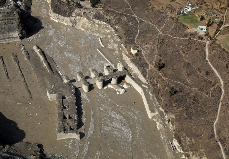 An aerial view shows a damaged barrage after a flash