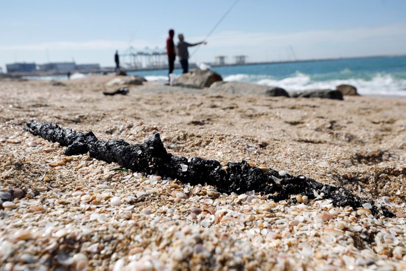 FILE PHOTO: Israel’s beaches blackened by tar after offshore oil