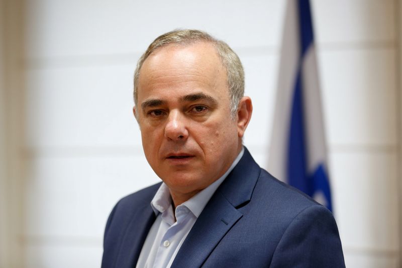 FILE PHOTO: Israel’s Energy Minister Yuval Steinitz poses for a