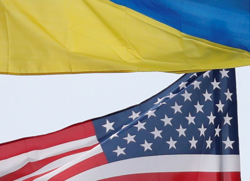 FILE PHOTO: Ukrainian and U.S. state flags fly in Kiev