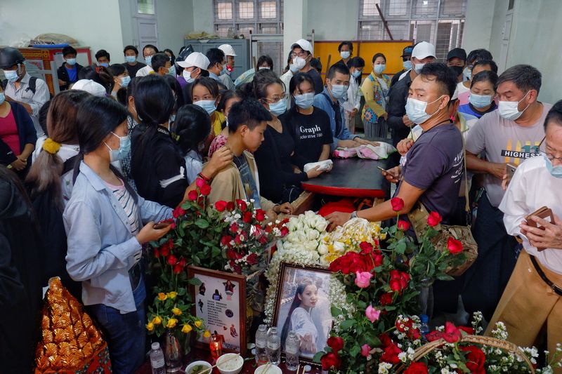 People attend the funeral of Angel, 19-year-old protester also known