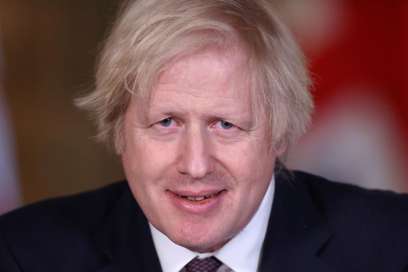 Britain’s PM Johnson holds a virtual news conference in London