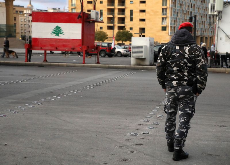 A Lebanese police walks in Beirut